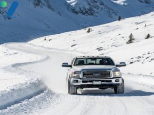 a-4x4-truck-demonstrates-safety-and-control-using-the-best-winter-tires-for-trucks-on-a-snowy-mountain-highway