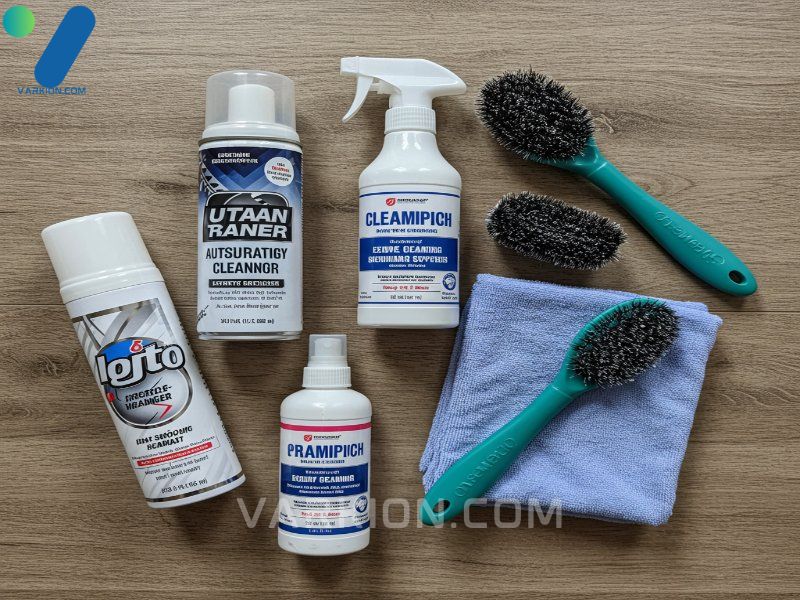 a-flat-lay-of-various-auto-upholstery-cleaning-products-including-a-can-of-foaming-cleaner