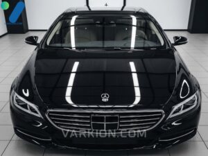 a-showroom-quality-highly-reflective-black-sedan-finished-with-professional-car-cleaning-and-polishing