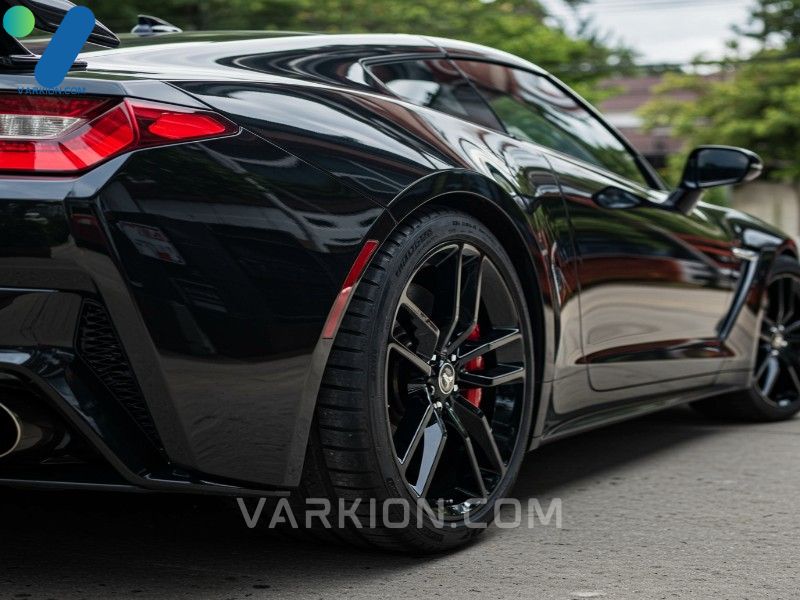 black-sports-car-with-a-flawless-mirror-like-reflection-and-deep-wet-polish