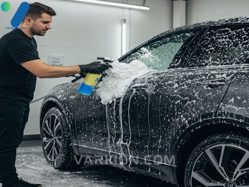 dark-car-covered-in-thick-white-pre-wash-foam-applied-by-a-foam-cannon