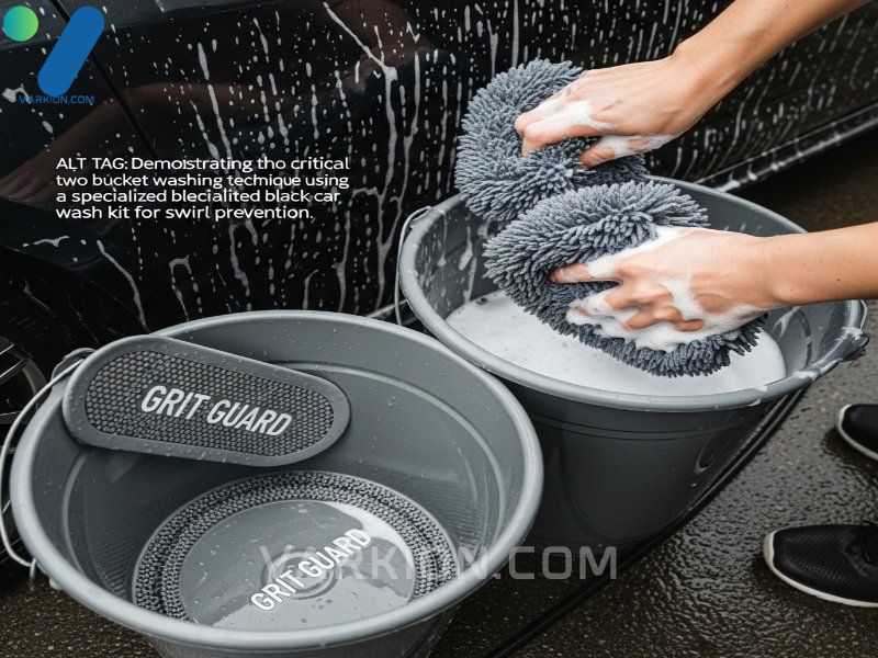 demonstrating-the-critical-two-bucket-washing-technique-using-a-specialized-black-car-wash-kit-for-swirl-prevention