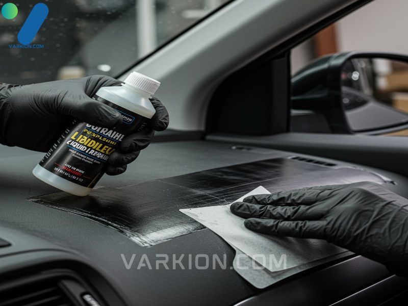 detailer-repairing-damaged-soft-dashboard-vinyl-with-liquid-compound-and-grain-matching-sheet
