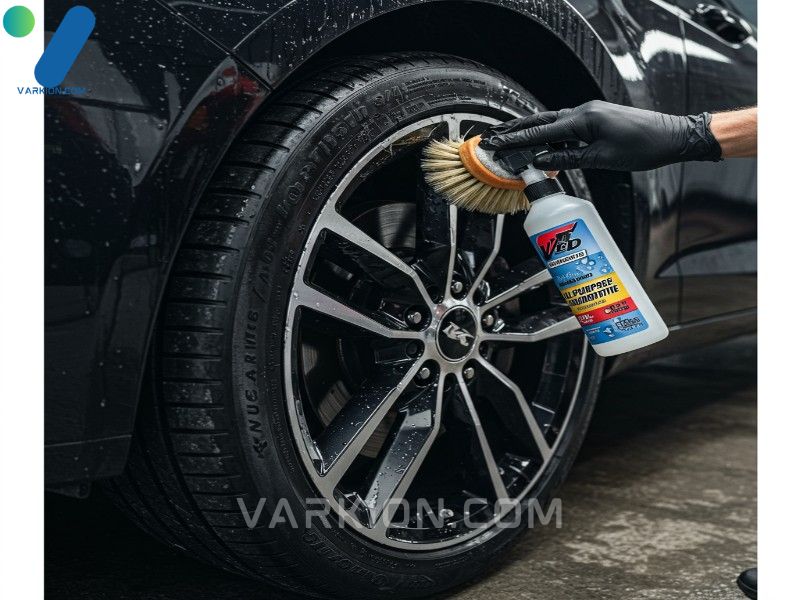 detailer-scrubbing-a-heavily-soiled-car-wheel-with-a-brush