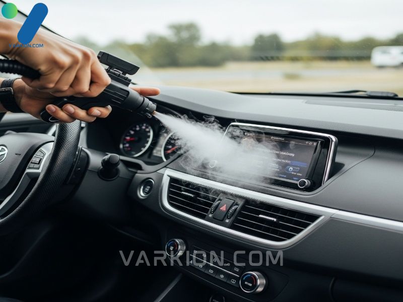 detailer-steam-cleaning-a-cars-dashboard-and-air-vents-for-deep-sanitization