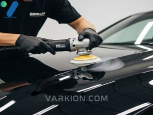 detailer-using-a-da-polisher-on-the-hood-of-a-black-car-for-paint-correction