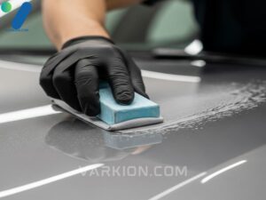 exterior-detailing-process-showing-the-use-of-a-clay-bar-to-remove-deep-contaminants-from-the-paint-crucial-for-finding-the-best-car-detail-close-to-me