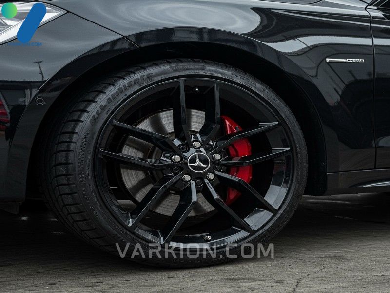 finished-detailing-result-showing-a-perfectly-clean-wheel-and-a-deep-matte-black-tire-achieved-by-using-high-quality-wheel-and-tire-cleaner