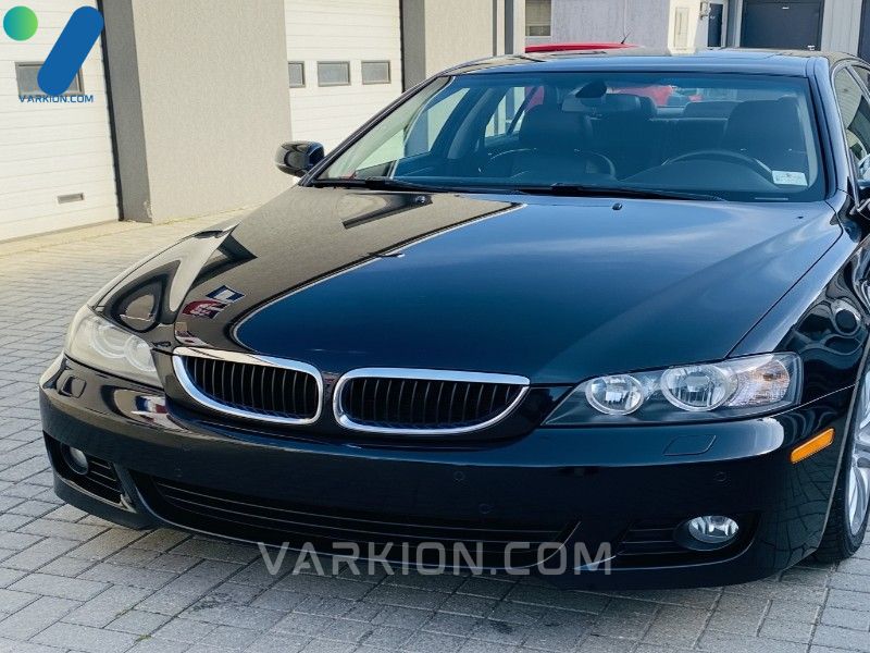 finished-result-of-finding-the-best-car-detail-close-to-me-showing-a-perfectly-glossy-black-sedan-after-professional-exterior-detailing-and-protective-coating
