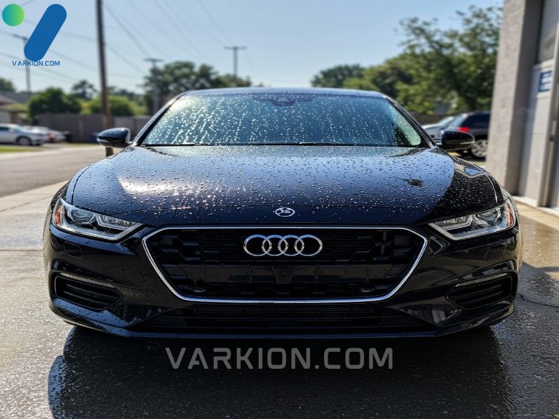 finished-wash-on-a-glossy-black-car-showing-perfect-water-beading-achieved-after-cleaning-with-a-ceramic-safe-best-car-wash-soap-for-foam-cannon