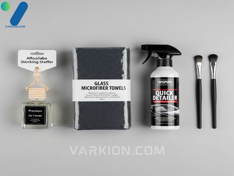 flat-lay-of-affordable-car-care-gifts-air-freshener-microfiber-towels-detailer-spray-and-brush-kit