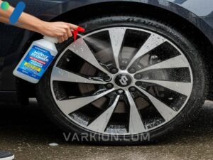 hand-spraying-thick-cleaner-onto-a-dirty-alloy-wheel