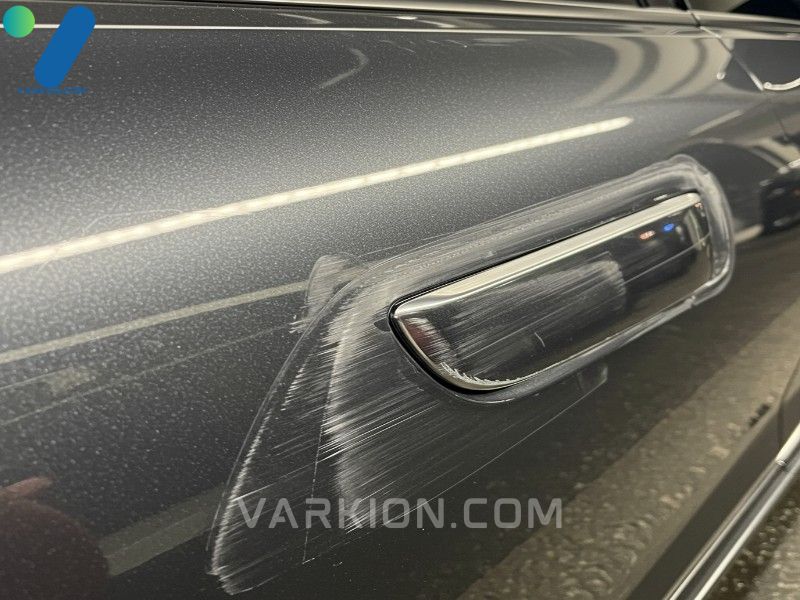 highly-reflective-metallic-car-door-panel-with-a-successful-invisible-scratch-repair