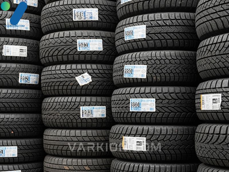 large-stack-of-new-premium-snow-tires-showing-various-tread-patterns-for-cars-and-suvs