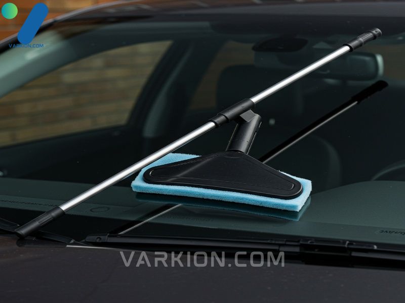 long-handled-windshield-cleaning-wand-identified-as-the-best-tool-for-cleaning-inside-of-windshield-highlighting-the-pivoting-head