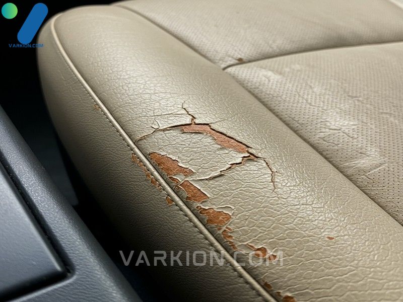 macro-shot-of-damaged-cracked-and-dirty-beige-car-leather