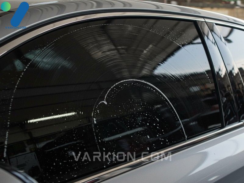 perfectly-cleaned-glossy-dark-tinted-car-window-with-a-streak-free-finish