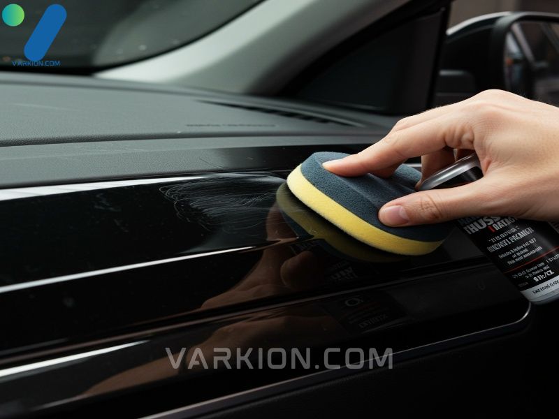 polishing-glossy-piano-black-interior-trim-with-a-foam-pad-and-compound-to-remove-scratches