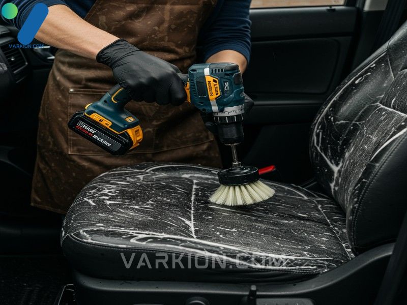 professional-technique-for-agitating-the-best-cleaner-for-cloth-car-seats-into-the-fabric-fibers-using-a-drill-brush-attachment