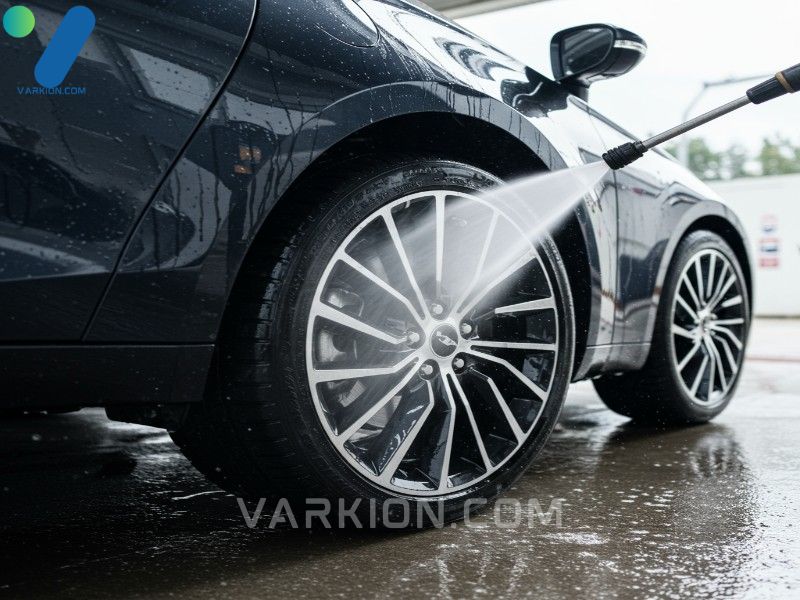 rinsing-a-clean-tire-after-using-tire-cleaners-and-agitation-ensuring-all-chemicals-and-grime-are-washed-away
