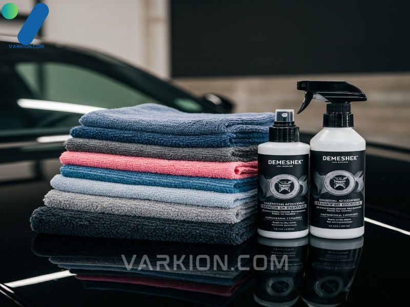 stack-of-colorful-microfiber-detailing-towels-next-to-a-spray-bottle