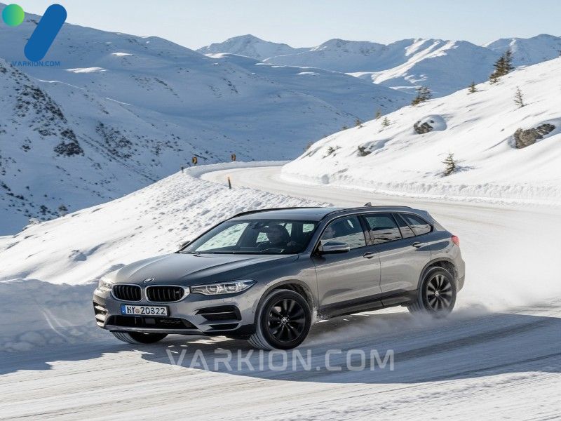 suv-moderno-con-neumaticos-de-invierno-de-banda-profunda-conduciendo-con-confianza-en-una-carretera-de-montana-nevada