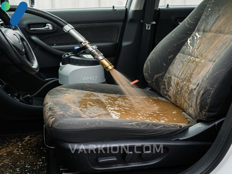 using-a-hot-water-extractor-machine-with-a-specialized-fabric-cleaner-to-deep-clean-and-sanitize-a-heavily-soiled-car-seat